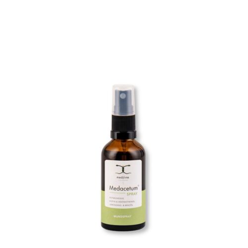 Eine kompakte Sprühflasche Medacetum Mundpflege Spray auf einem hellen, sauberen Untergrund.